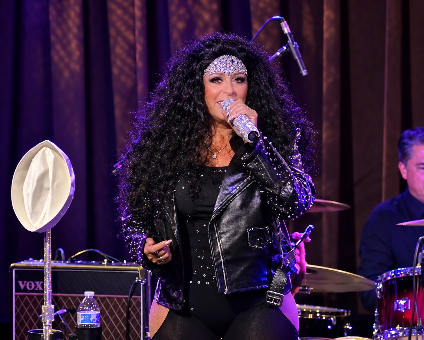 Cher Alike performing live in a rhinestone leather jacket